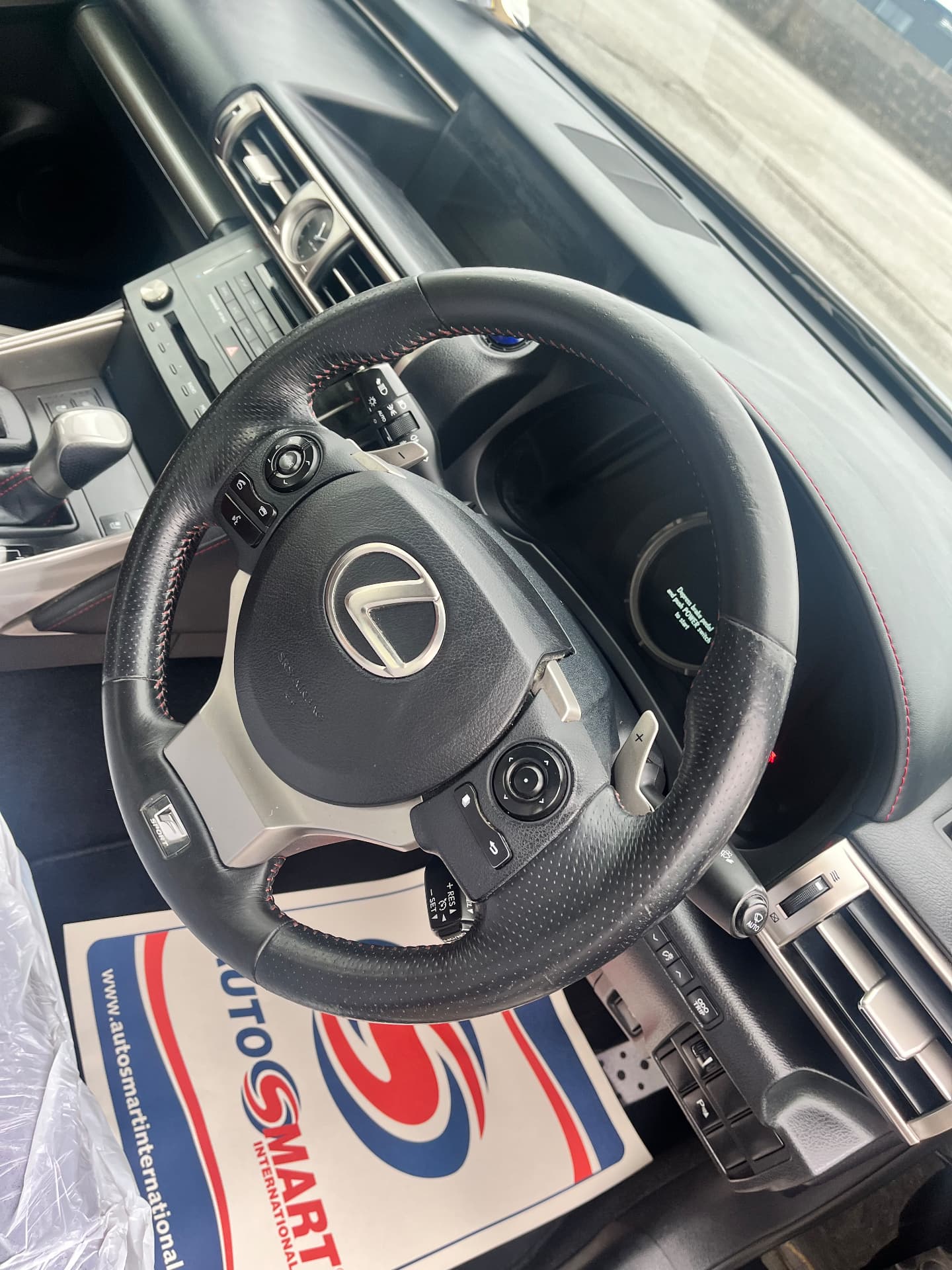 The same Lexus leather steering wheel after repair and refinishing by PJ Leather Paint